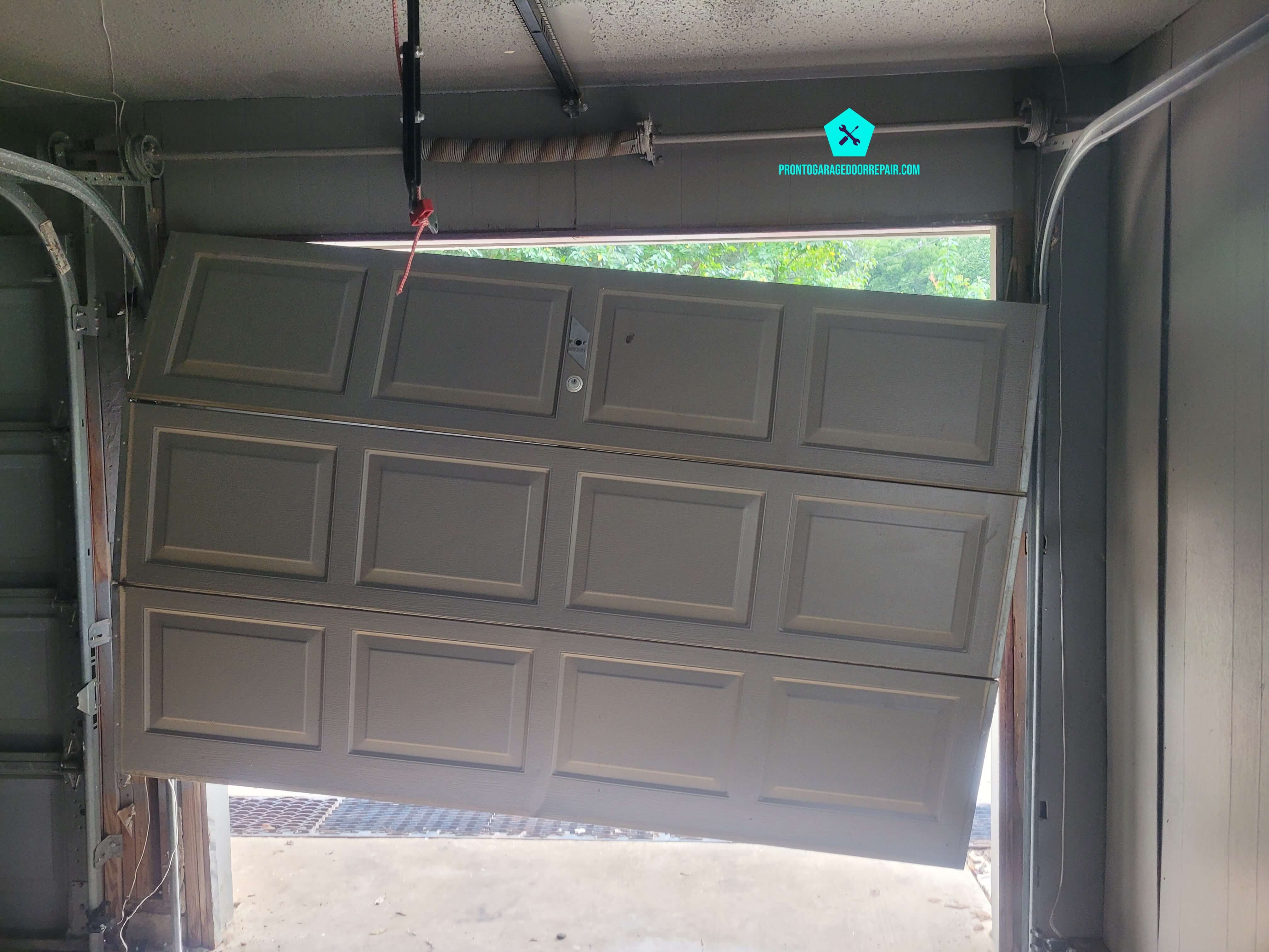 single-garage-door-damaged